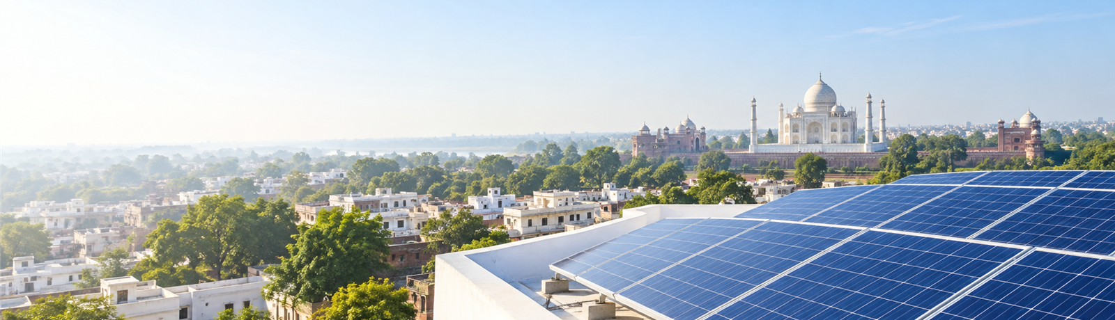 Solar panels on a rooftop overlooking Agra
